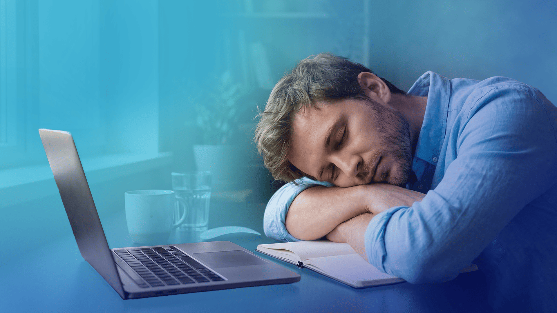 Man tired because of post lunch sleep in front of laptop