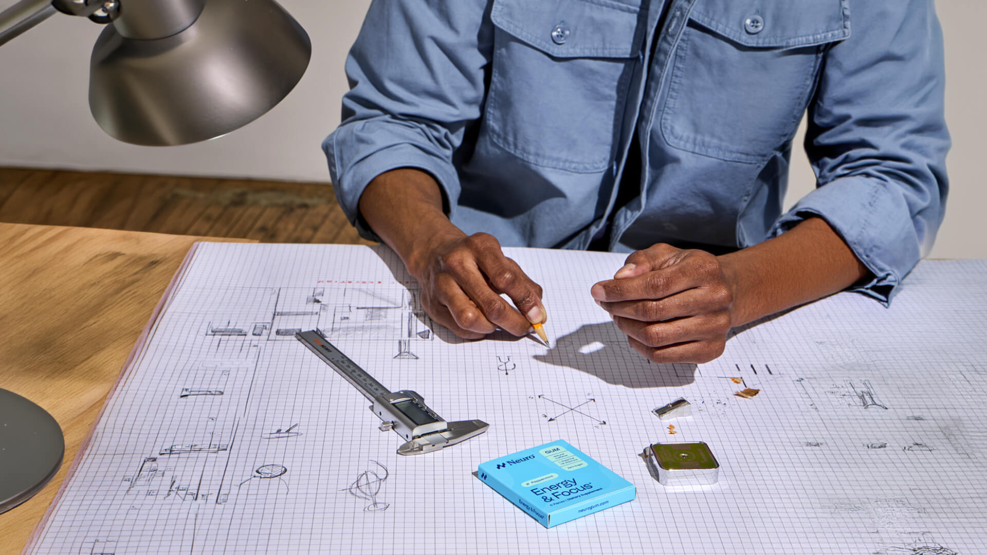 man working on a desk uses Neuro as nootropic