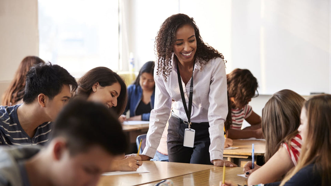 teacher smiling has energy to teach students classes