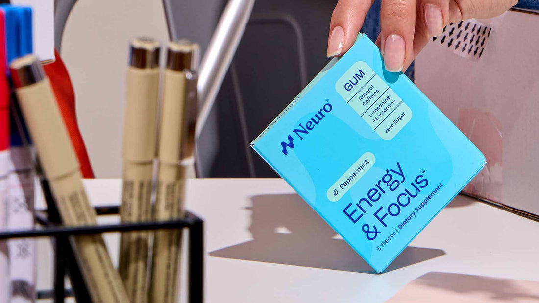 woman's hand at work holding an Energy & Focus pack